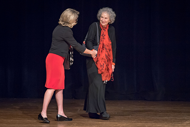 President Cervelli shakes hands with Margaret Atwood