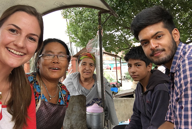 Julie Weilbaker '18 takes a selfie with new friends in Nepal