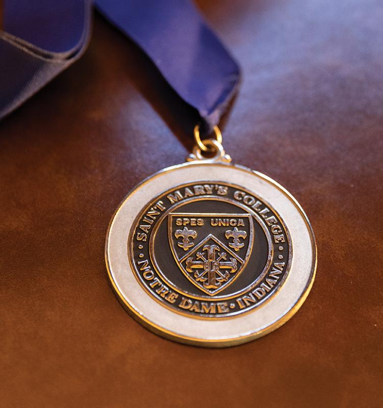 A medallion is presented to all endowed chairholders in a formal ceremony.