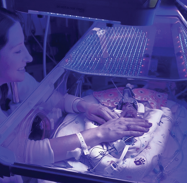 Katie Boyce Dunne ’05 in the early days of NICU with baby Mary Jo