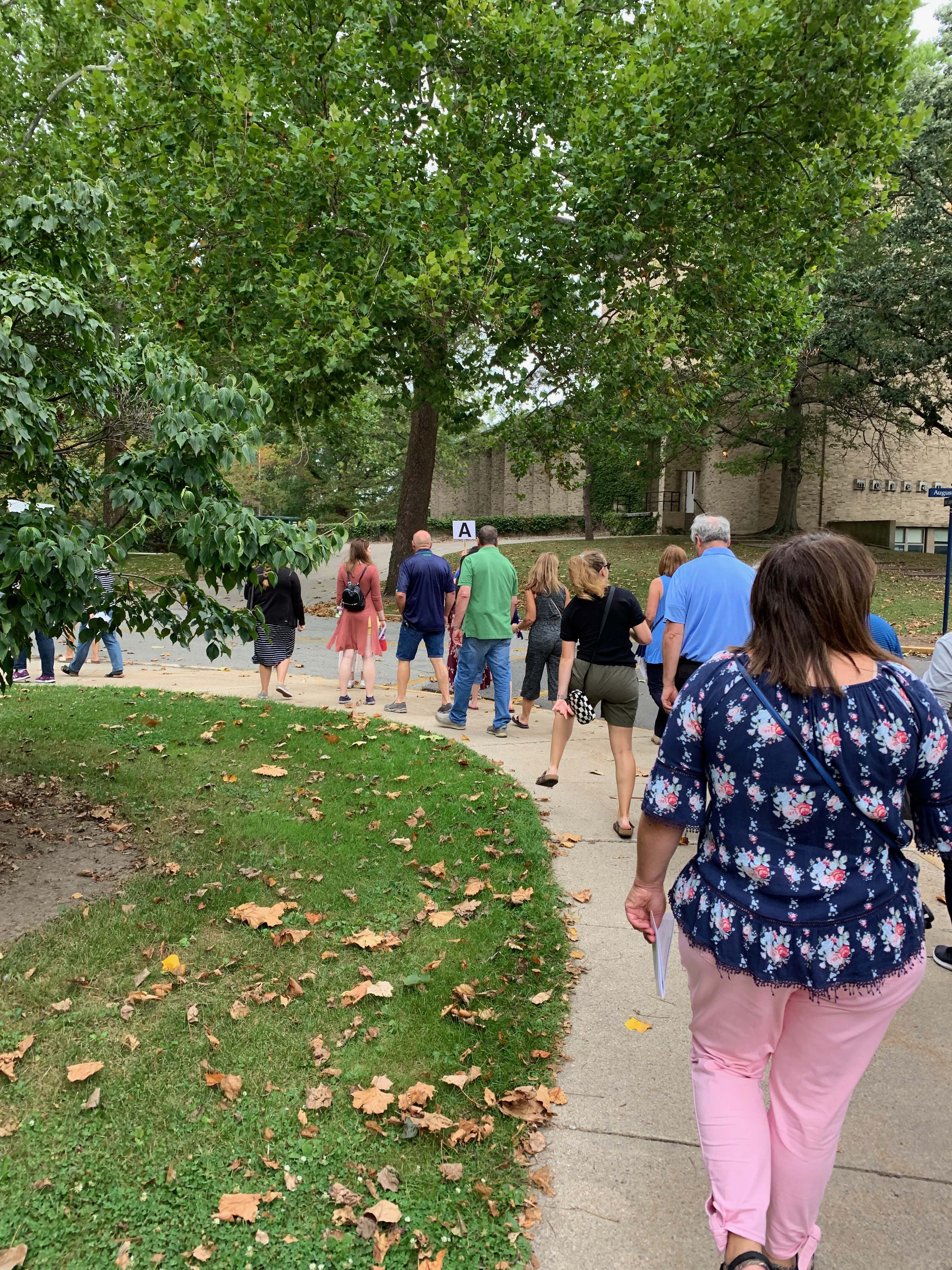 Pilgrims walking around campus 