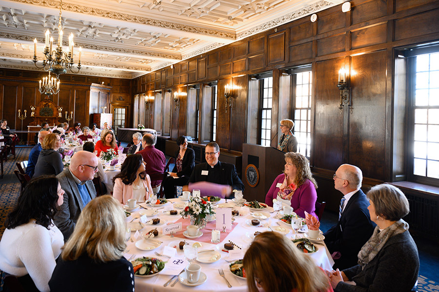 Faculty seated at awards luncheon