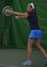 Shannon Elliott prepares to serve against Olivet on Sunday. (Photo courtesy of Geoff Henson, Olivet SID)