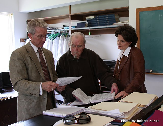 Music professor Nancy Menk, right, looks over music with Howard Terrell, center, and Robert Nance, left. (Photo courtesy of Nance.)