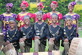 Ugandan Kids Choir smiling in a group