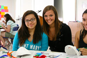 Camper Ashley Roman of Park Ridge, Illinois, left, and Spiritual Leaders Camp mentor Christine Czajkowski '14 say attending camp helped them decide to attend Saint Mary's College. Ashley, a junior in high school, plans to attend Saint Mary's. 