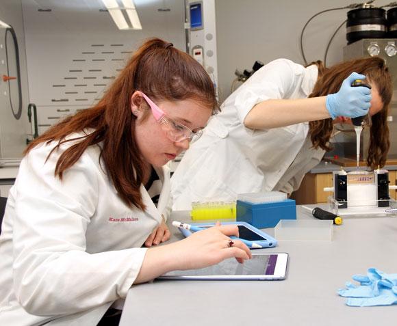 Catherine "Kate" McMahon '18 working in lab