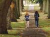 Two students walking on Avenue sidewalk